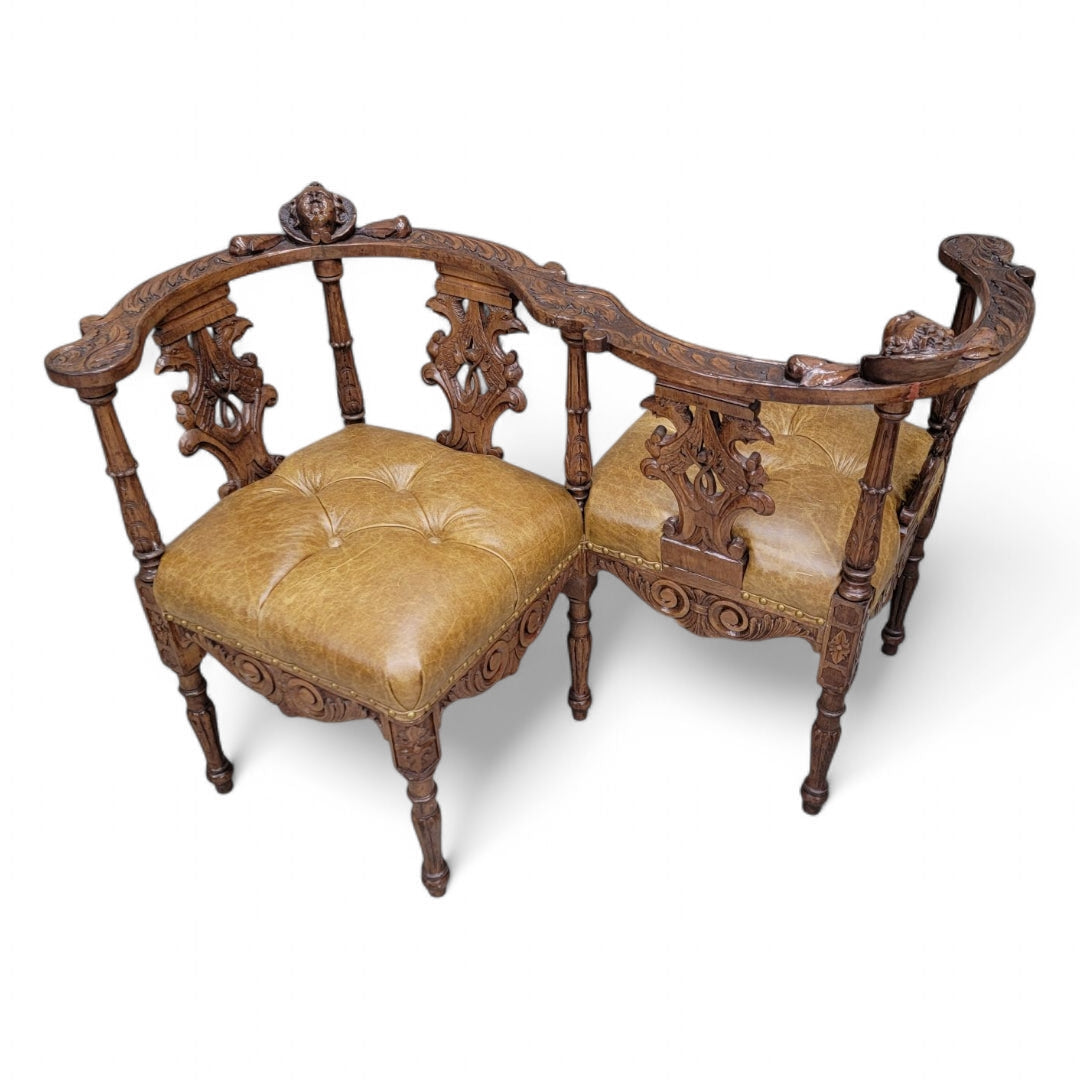 Antique Italian Renaissance Revival Ornate Carved Figural Tufted Tete-a-Tete Bench Newly Reupholstered in Leather