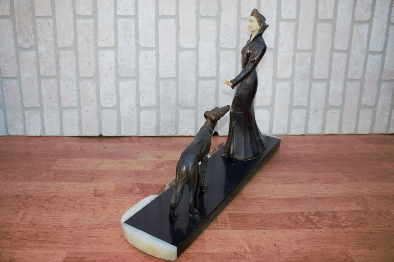 Captivating Art Deco Brass Sculpture: The Elegant Lady and Her Faithful Hound