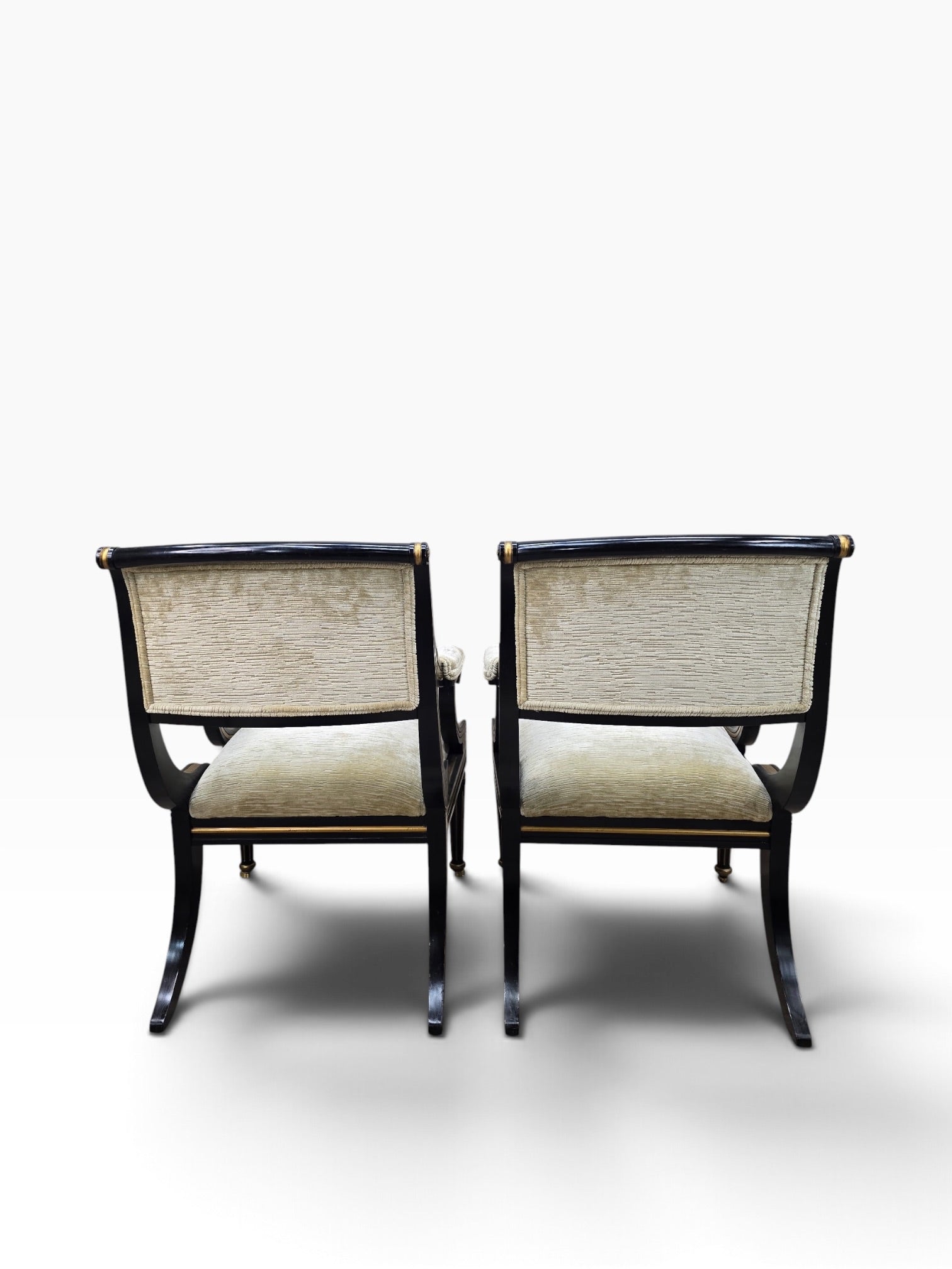 Regency Style Ebonized Armchairs by Baker Newly Reupholstered in a Gold Chenille Fabric - Pair