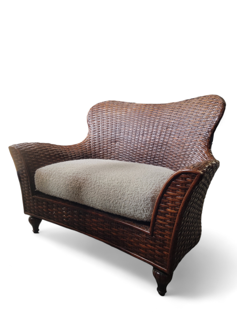 Vintage Arched Camel Back Flare Arm Wicker Lounge Settee
With Newly Upholstered Pillow in Boucle
