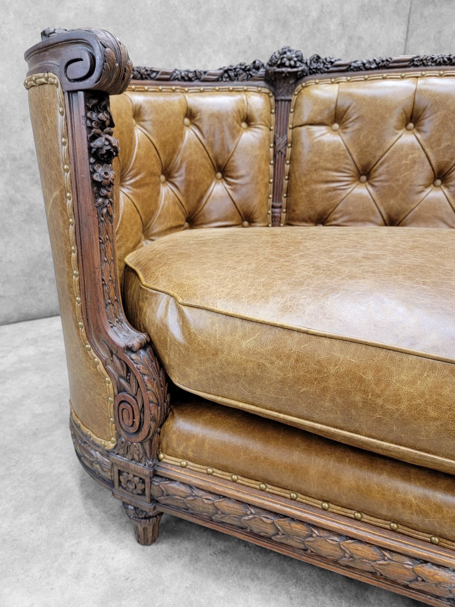 Antique French Regency Mahogany Carved and Curved Sofa Newly Reupholstered in Leather