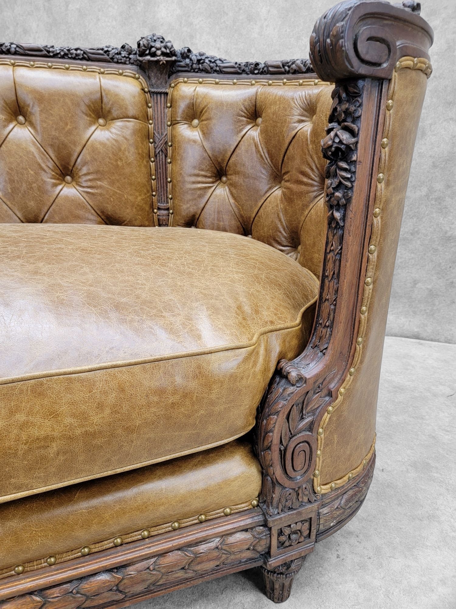 Antique French Regency Mahogany Carved and Curved Sofa Newly Reupholstered in Leather