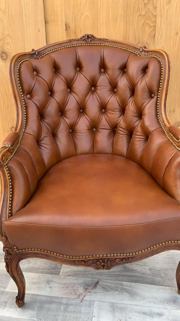 Antique French Provincial Hand Carved Walnut Bergere Chair Newly Upholstered In Full-Grain "Whiskey" Tufted Italian Leather