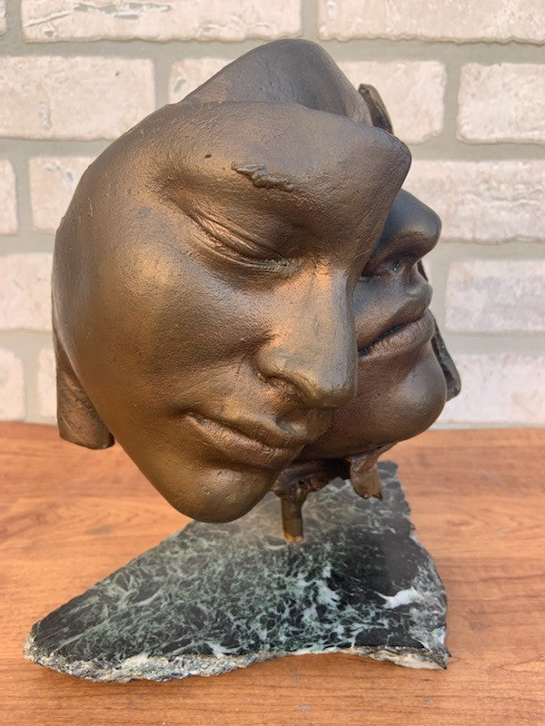 Bronze Face Sculpture on a Marble Stand