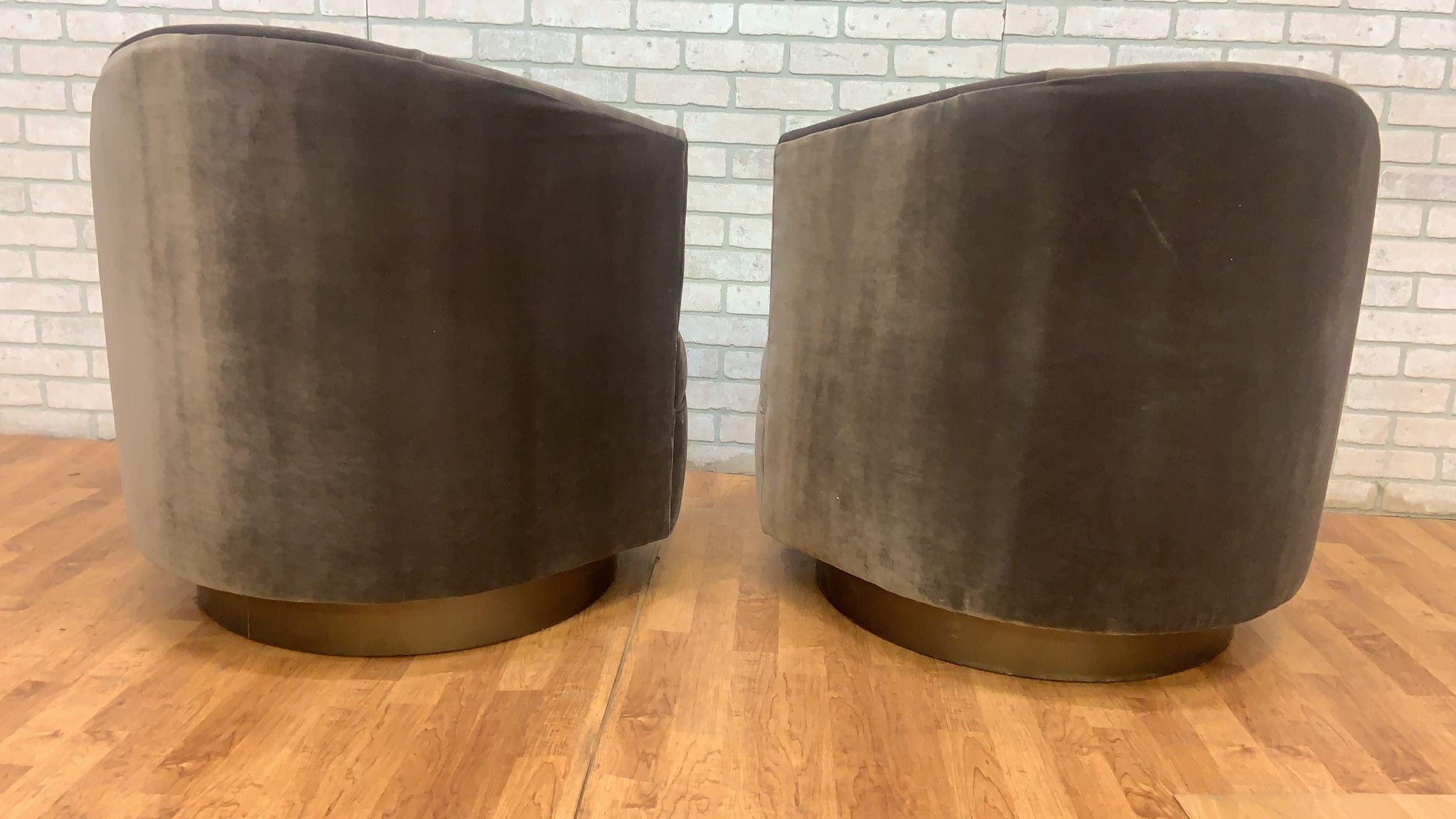 Post Modern Asymmetrical Barrel Back Swivel Chairs Newly Reupholstered in Grey Velvet on a Bronze Base