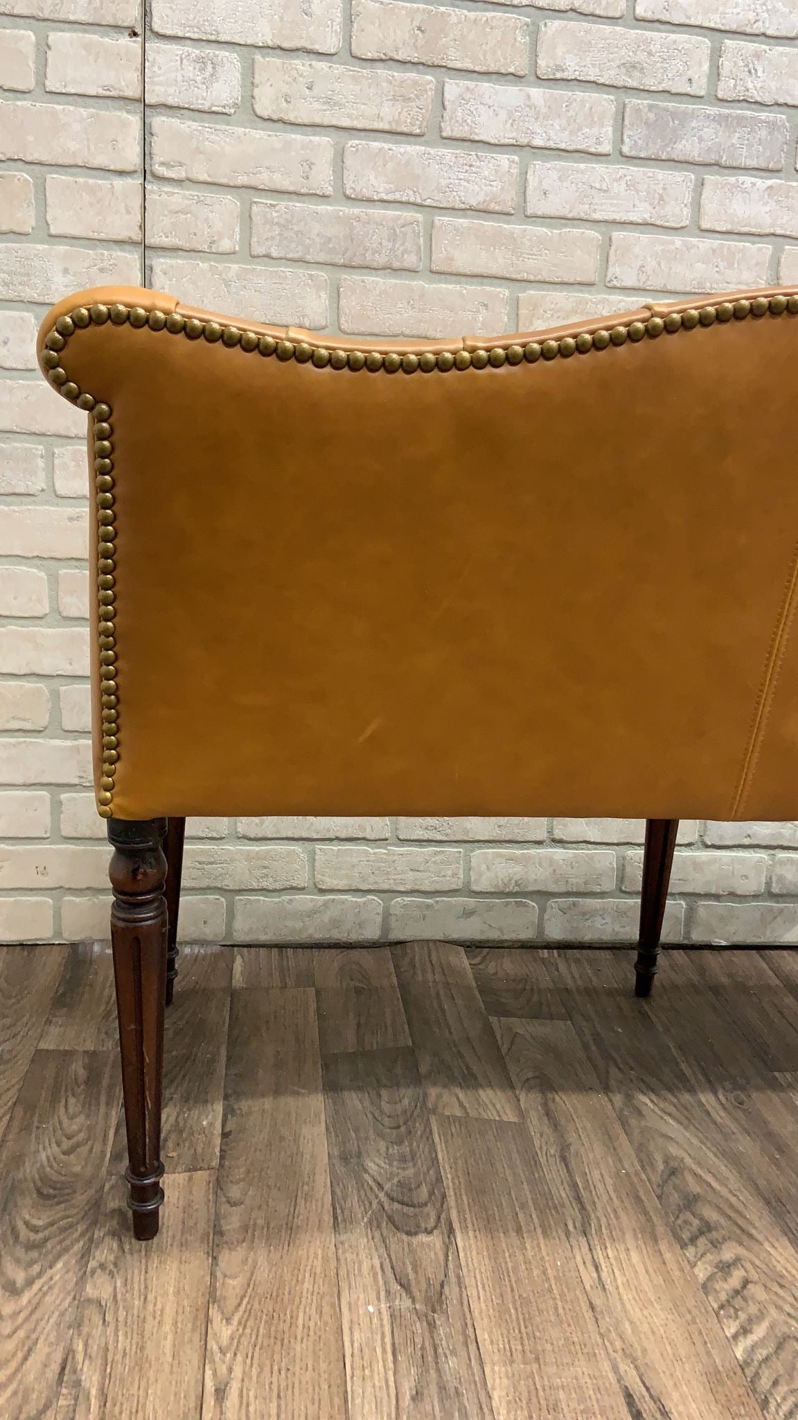 Antique British Colonial Settee Newly Upholstered in Cognac Leather