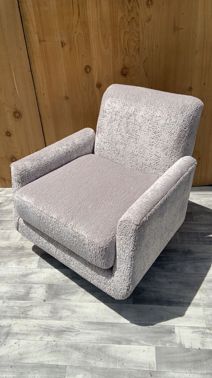 Mid Century Modern Swivel Lounge Chair Newly Upholstered in a Ivory Chenille