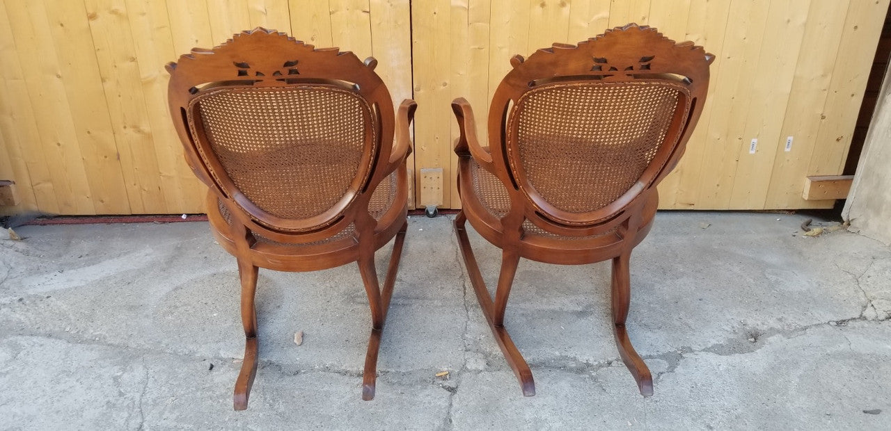 Antique French Mahogany Louis XV Style Heavily Carved Cane Rocking Chairs - Pair
