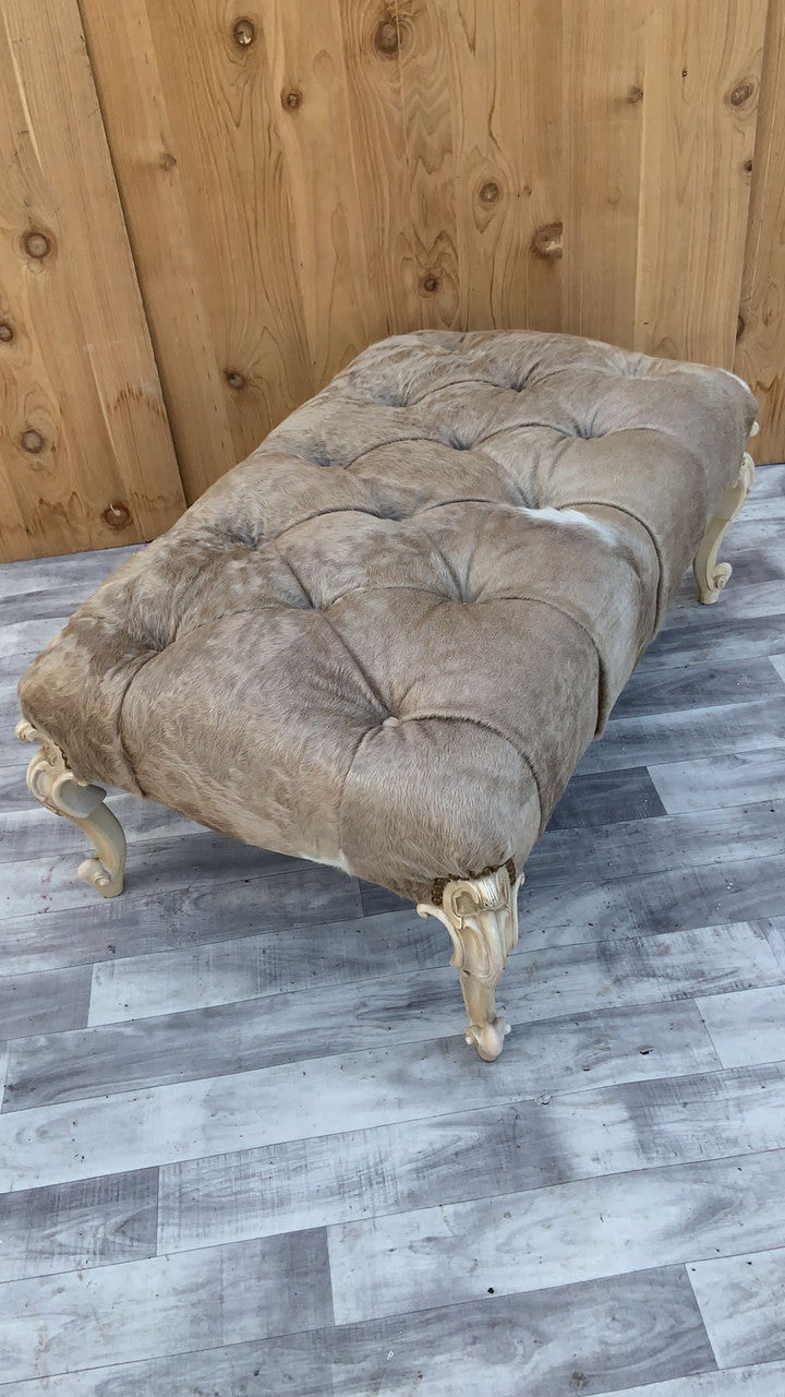Vintage French Provincial Style Ottoman with Hand Carved Cabriole Legs Newly Upholstery in a Brazilian Cowhide “Cafe Latte” Color