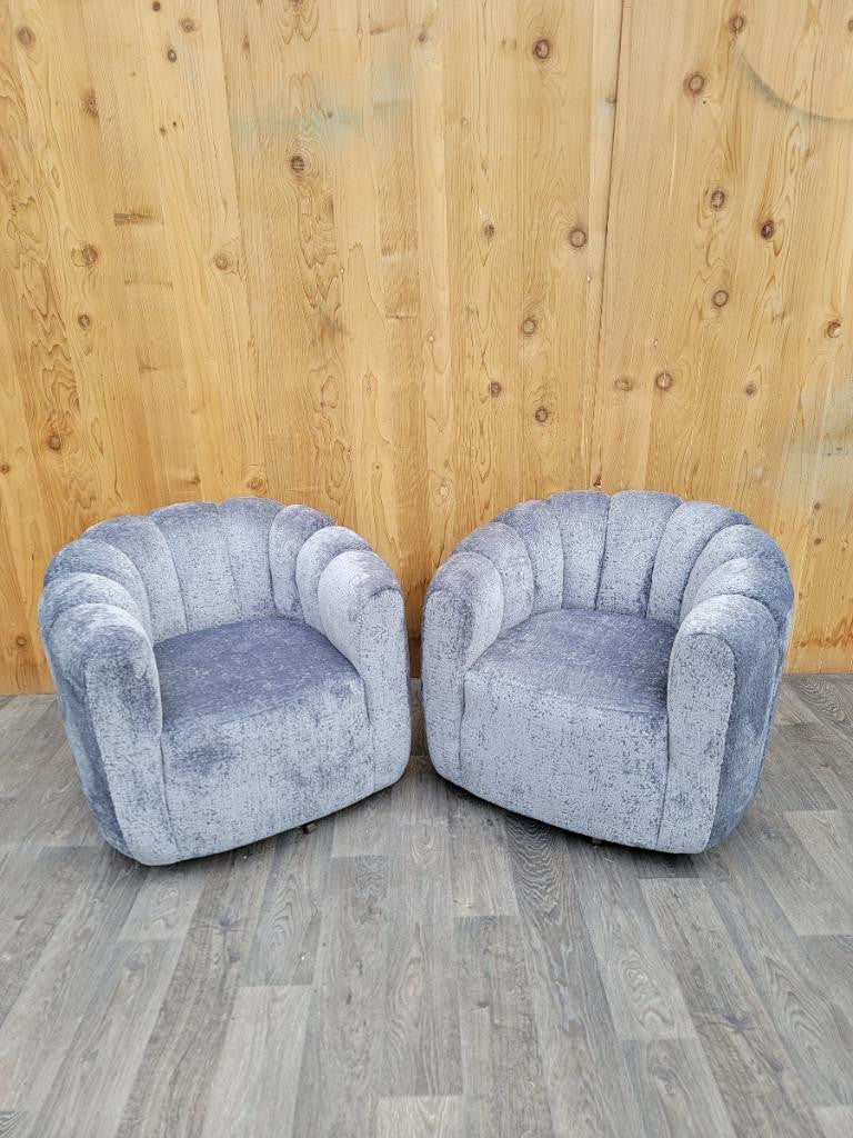 Mid Century Modern Channel-Back Swivel Lounge Chairs Newly Upholstered in "Powder-Blu" Boucle