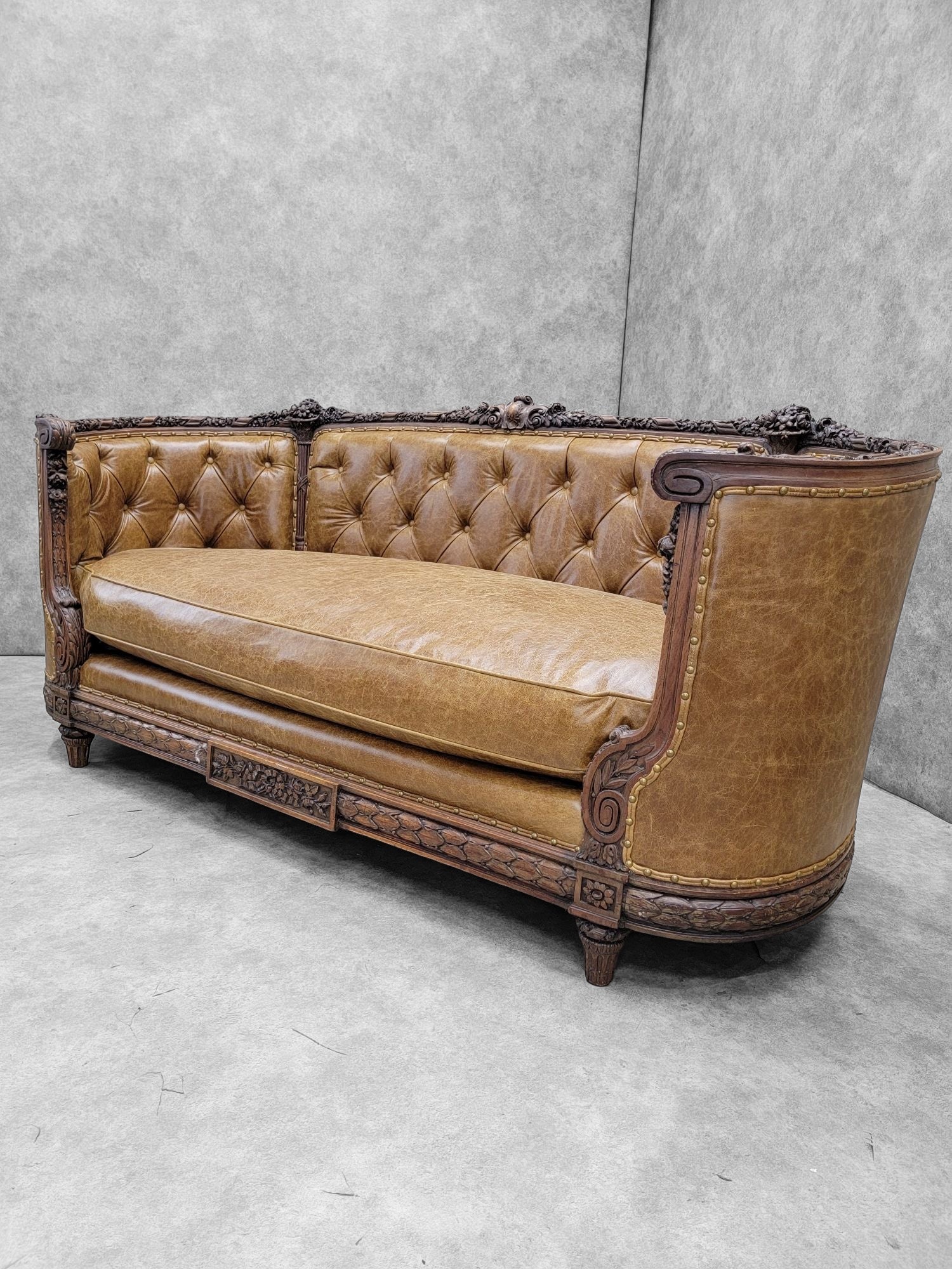 Antique French Regency Mahogany Carved and Curved Sofa Newly Reupholstered in Leather