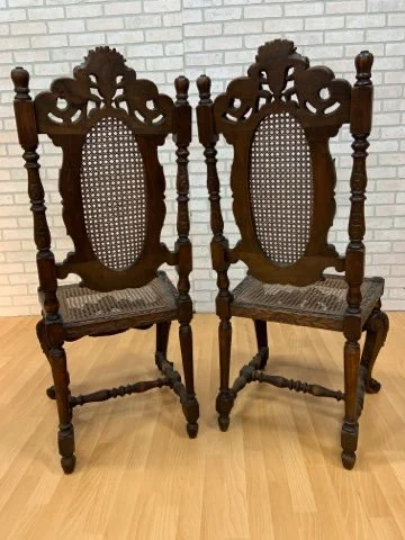 Antique Jacobean Renaissance Revival Heavily Carved Oak Cane Throne Chairs - Pair