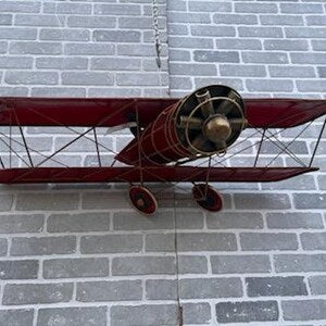 Mid Century Modern Red Enamel Biplane Metal Wall Sculpture by Curtis Jere